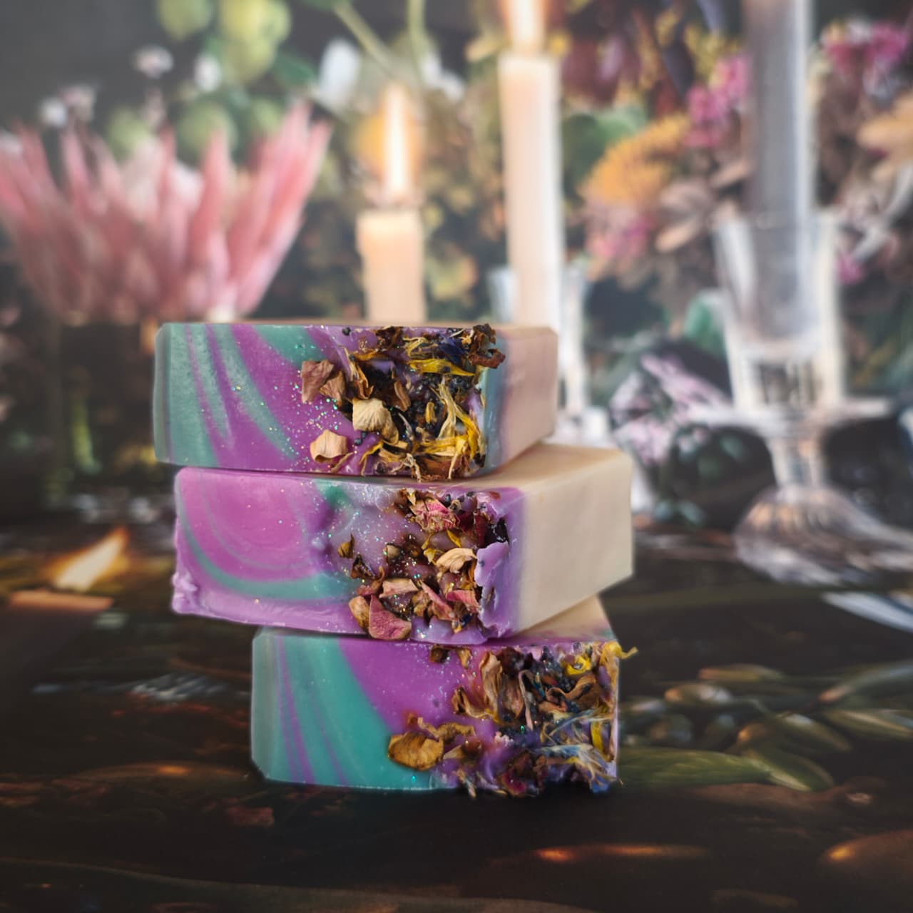This pretty Flower Child Goat Milk Soap is a natural, cold‑processed goat milk soap handcrafted in South Africa with May Chang, Mint, and Bulgarian Lavender essential oil.  Moisturising, uplifting, and beautifully swirled in purple‑pink and peacock green.